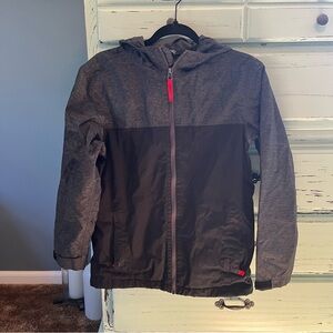The North Face Kids Black and Dark Gray lined Raincoat. Size large 14/16.